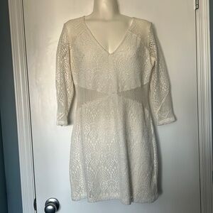 Divided White Mini Dress with Lace Overlay and Cut Outs